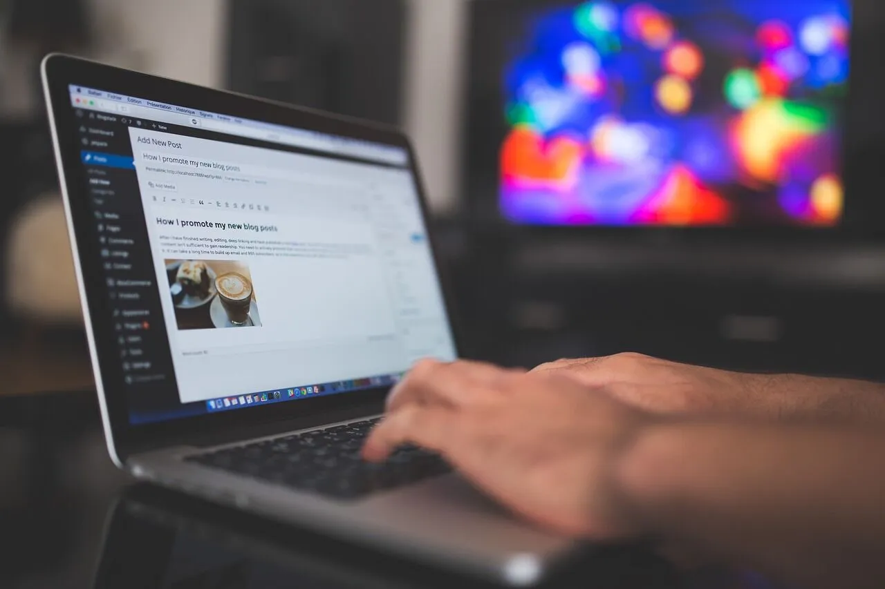 How to Speed Up Your WordPress Website for Better User Experience and SEO 1 Man working on laptop to improve WordPress website speed and SEO performance